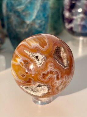 Orange Ocean Jasper Sphere with Druzy Pockets – Orbicular Crystal Sphere w Stand